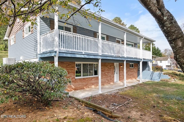 rear view of house featuring a patio area