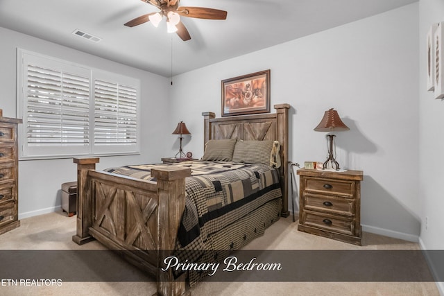 carpeted bedroom with ceiling fan