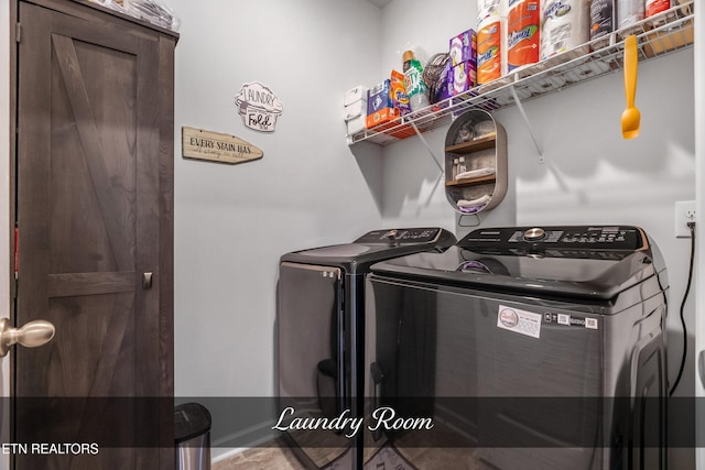 laundry area featuring washing machine and dryer