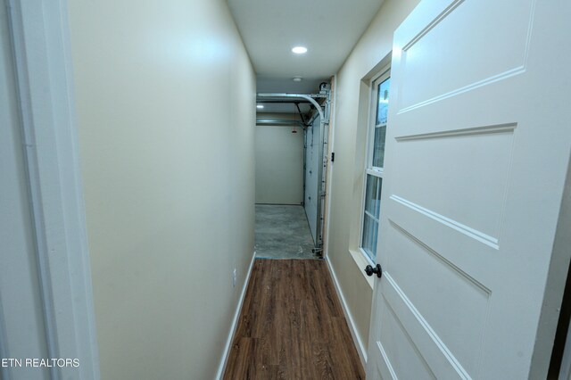 hallway featuring wood-type flooring