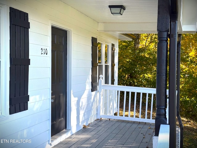 deck with covered porch