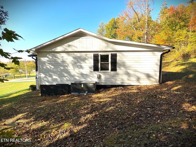 view of home's exterior featuring cooling unit