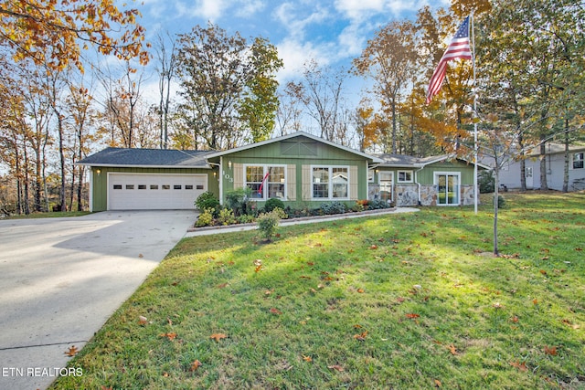 single story home with a front lawn and a garage