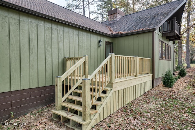 doorway to property with a wooden deck