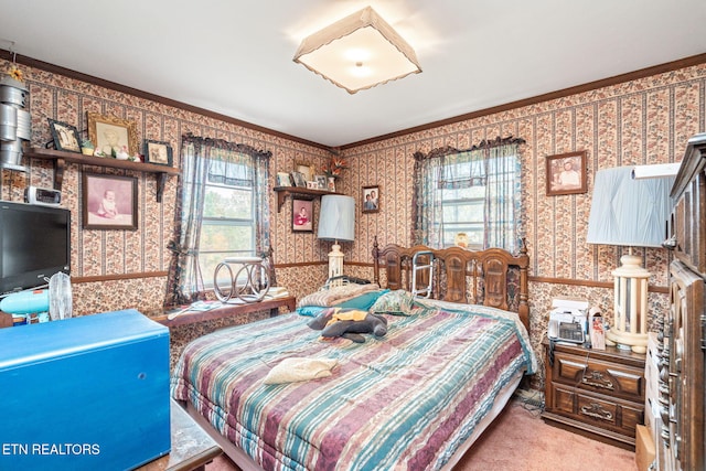 carpeted bedroom featuring crown molding and multiple windows