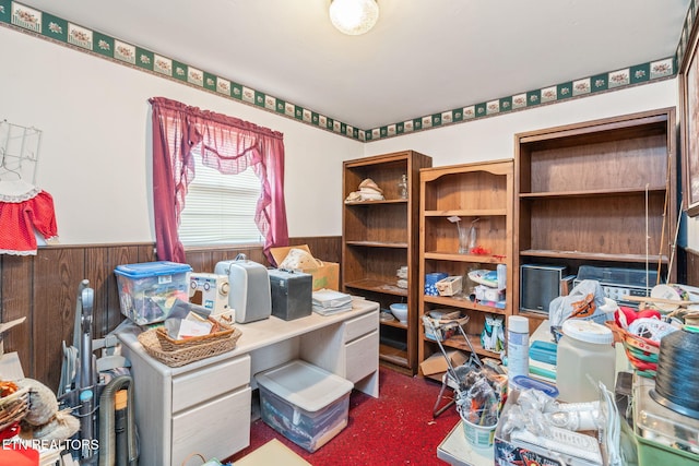 office area with wood walls