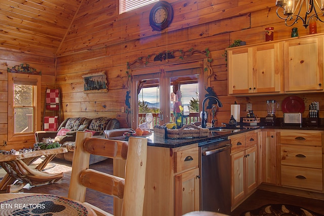 kitchen featuring dishwasher, high vaulted ceiling, dark hardwood / wood-style floors, wood walls, and a chandelier