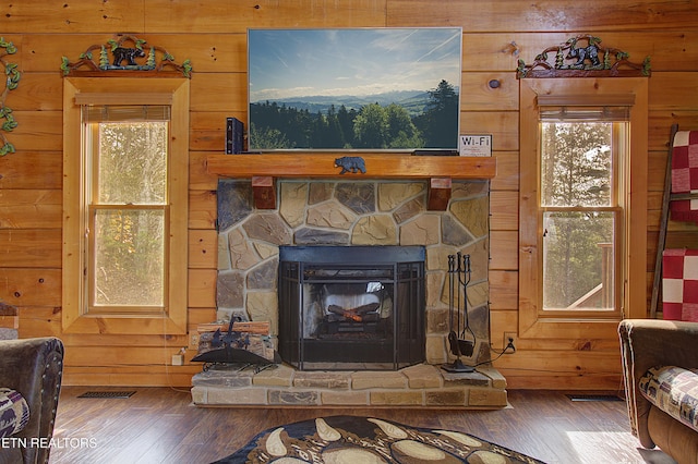 919 Buck Way, Sevierville, TN 37876 - detailed view of wood walls, wood finished floors, and a stone fireplace