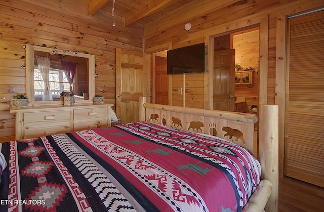919 Buck Way, Sevierville, TN 37876 - bedroom with wooden walls and wood ceiling with exposed beams