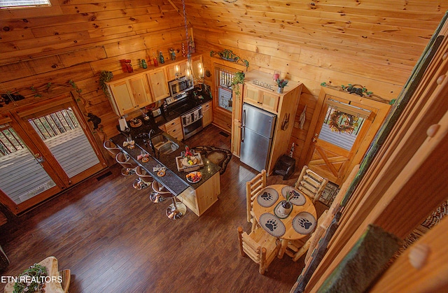 living room featuring dark hardwood / wood-style flooring, wooden ceiling, high vaulted ceiling, and wooden walls