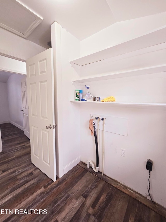 laundry room with dark wood-type flooring and washer hookup