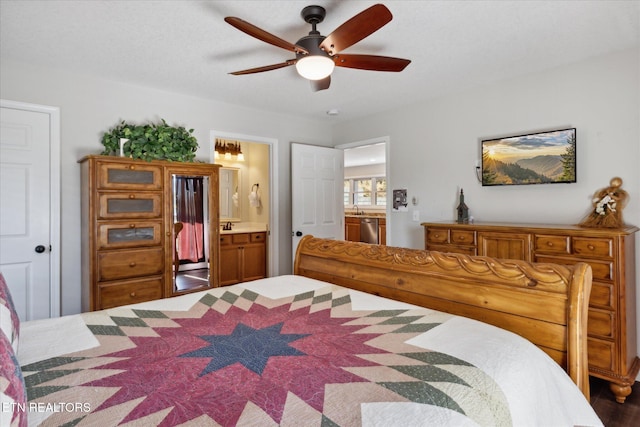 bedroom with sink, ceiling fan, hardwood / wood-style flooring, and ensuite bath