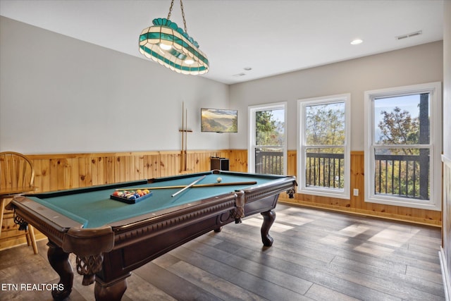 game room with wood walls, wood-type flooring, and billiards