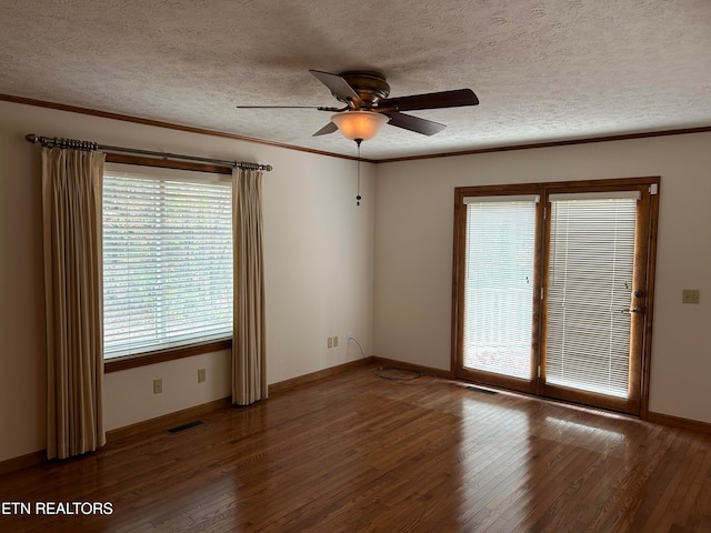 unfurnished room featuring ornamental molding, a textured ceiling, wood-type flooring, and ceiling fan