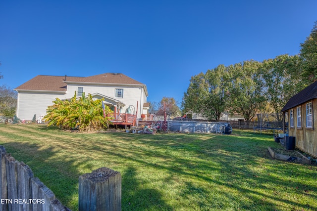 view of yard featuring a deck