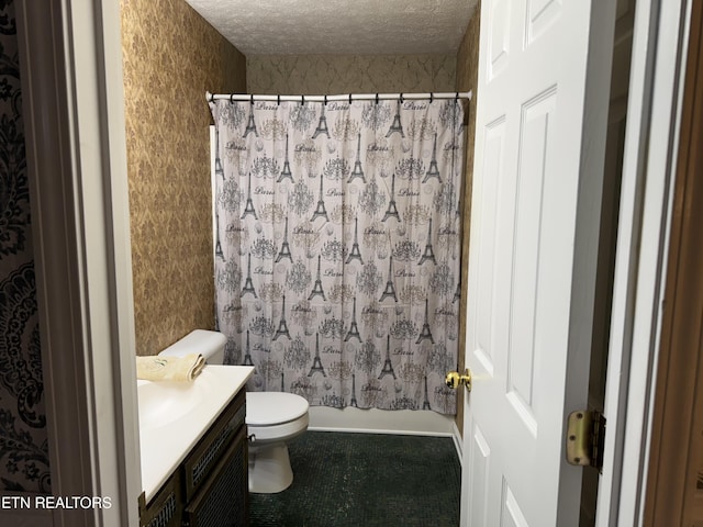 full bathroom featuring a textured ceiling, toilet, vanity, wallpapered walls, and shower / bathtub combination with curtain