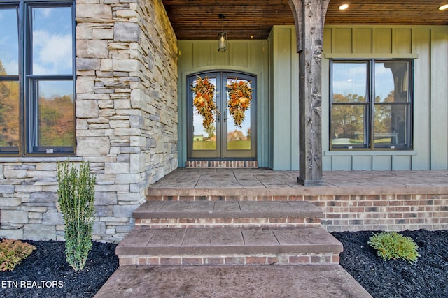 doorway to property featuring a porch