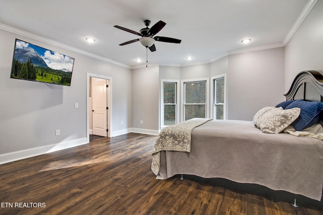 bedroom featuring crown molding, dark wood-type flooring, and ceiling fan