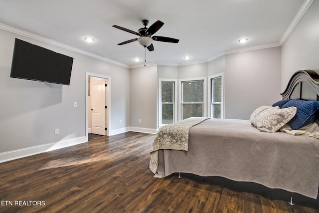 bedroom with ornamental molding, dark wood-type flooring, and ceiling fan