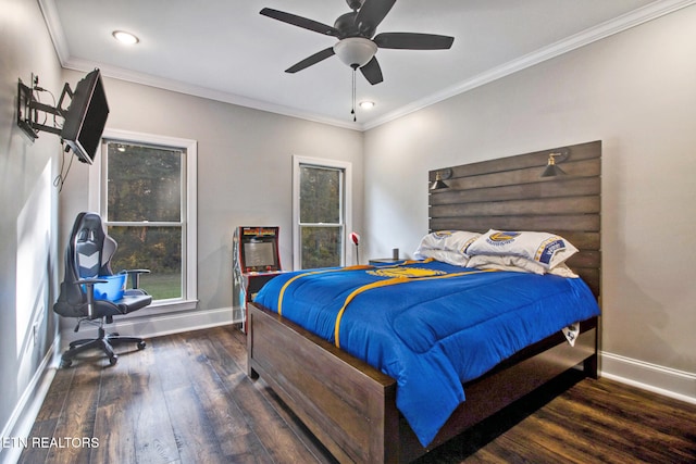 bedroom featuring dark wood-type flooring, crown molding, and ceiling fan