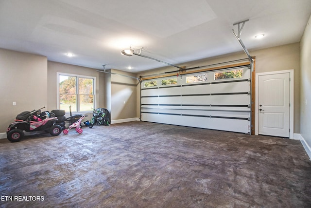 garage featuring a garage door opener