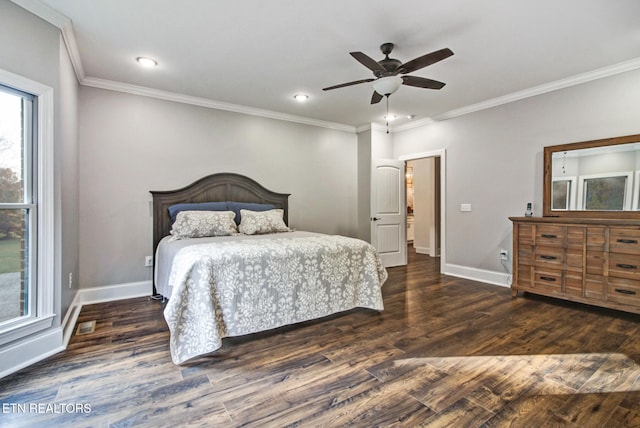 bedroom featuring crown molding, dark wood-type flooring, and ceiling fan