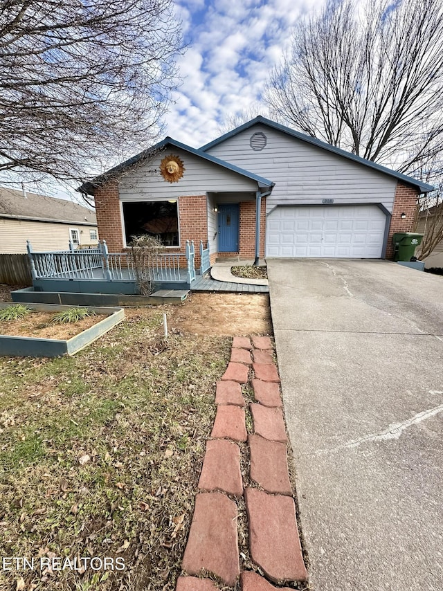 single story home with a garage