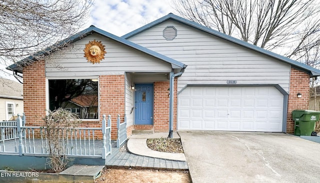 view of front of property featuring a porch and a garage