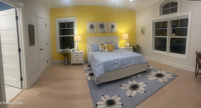 318 Buckhorn Way, Loudon, TN 37774 - bedroom with light wood finished floors, baseboards, and crown molding