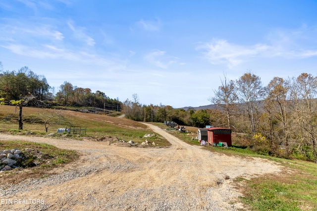 view of road featuring a rural view