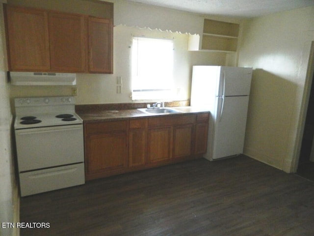 kitchen featuring a textured ceiling, white appliances, ventilation hood, sink, and dark hardwood / wood-style floors