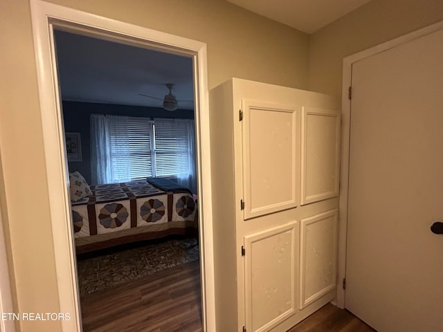 hallway featuring dark hardwood / wood-style floors