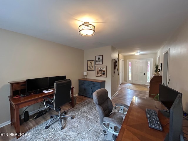 office area with hardwood / wood-style floors