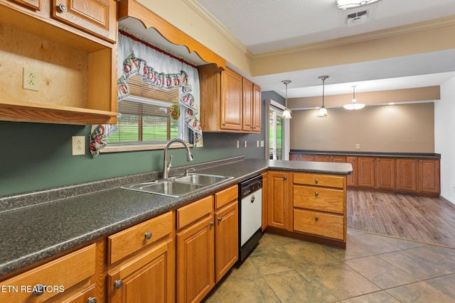 kitchen featuring dishwasher, crown molding, plenty of natural light, and sink