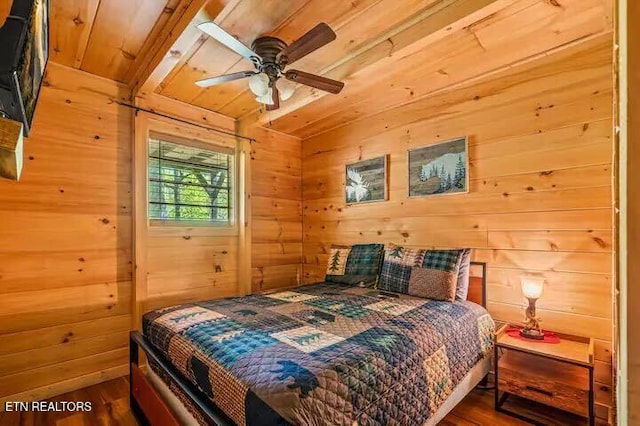 bedroom with hardwood / wood-style flooring, ceiling fan, wooden ceiling, and lofted ceiling