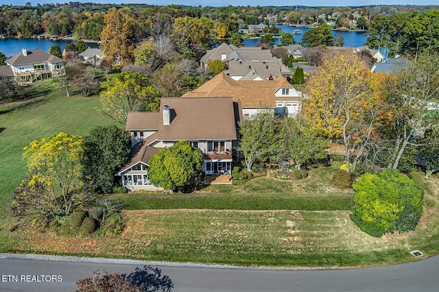 bird's eye view with a water view and a residential view