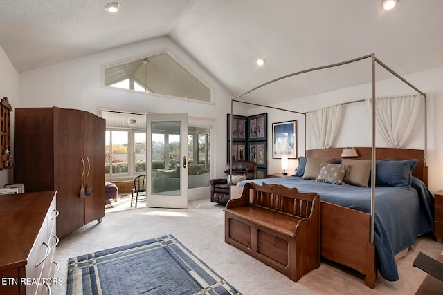 bedroom with french doors, a textured ceiling, access to exterior, lofted ceiling, and light colored carpet