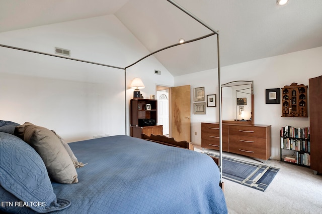 bedroom with carpet floors, high vaulted ceiling, and visible vents