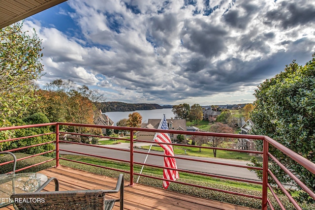 deck featuring a water view