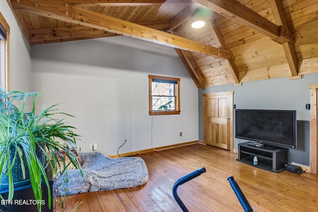 exercise room with hardwood / wood-style floors, wood ceiling, and vaulted ceiling