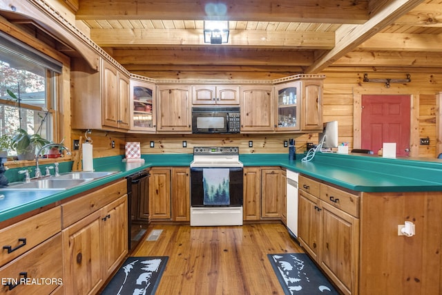 kitchen featuring wooden ceiling, sink, black appliances, beam ceiling, and light hardwood / wood-style flooring