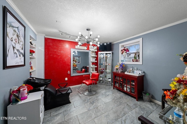 interior space with crown molding, a textured ceiling, a chandelier, and built in features