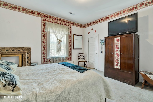 bedroom featuring carpet