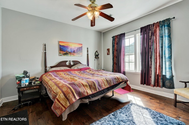 bedroom featuring ceiling fan and hardwood / wood-style flooring