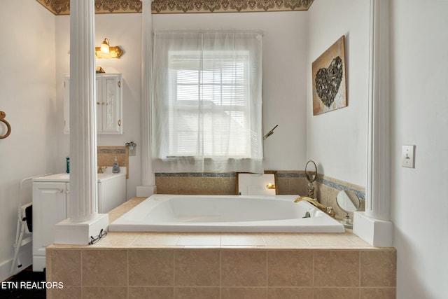 bathroom featuring tiled bath