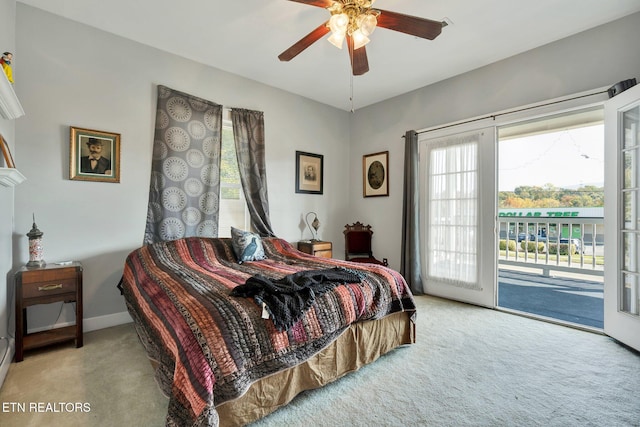 carpeted bedroom featuring ceiling fan and access to exterior