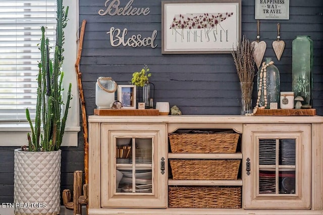 bar featuring wood walls