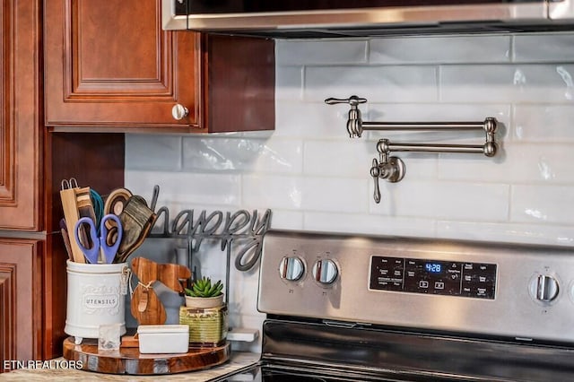 interior details featuring stainless steel range oven