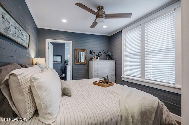 bedroom with crown molding and ceiling fan