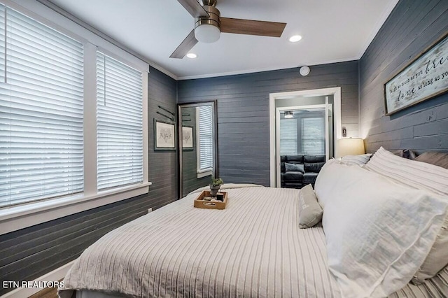 bedroom featuring crown molding and ceiling fan